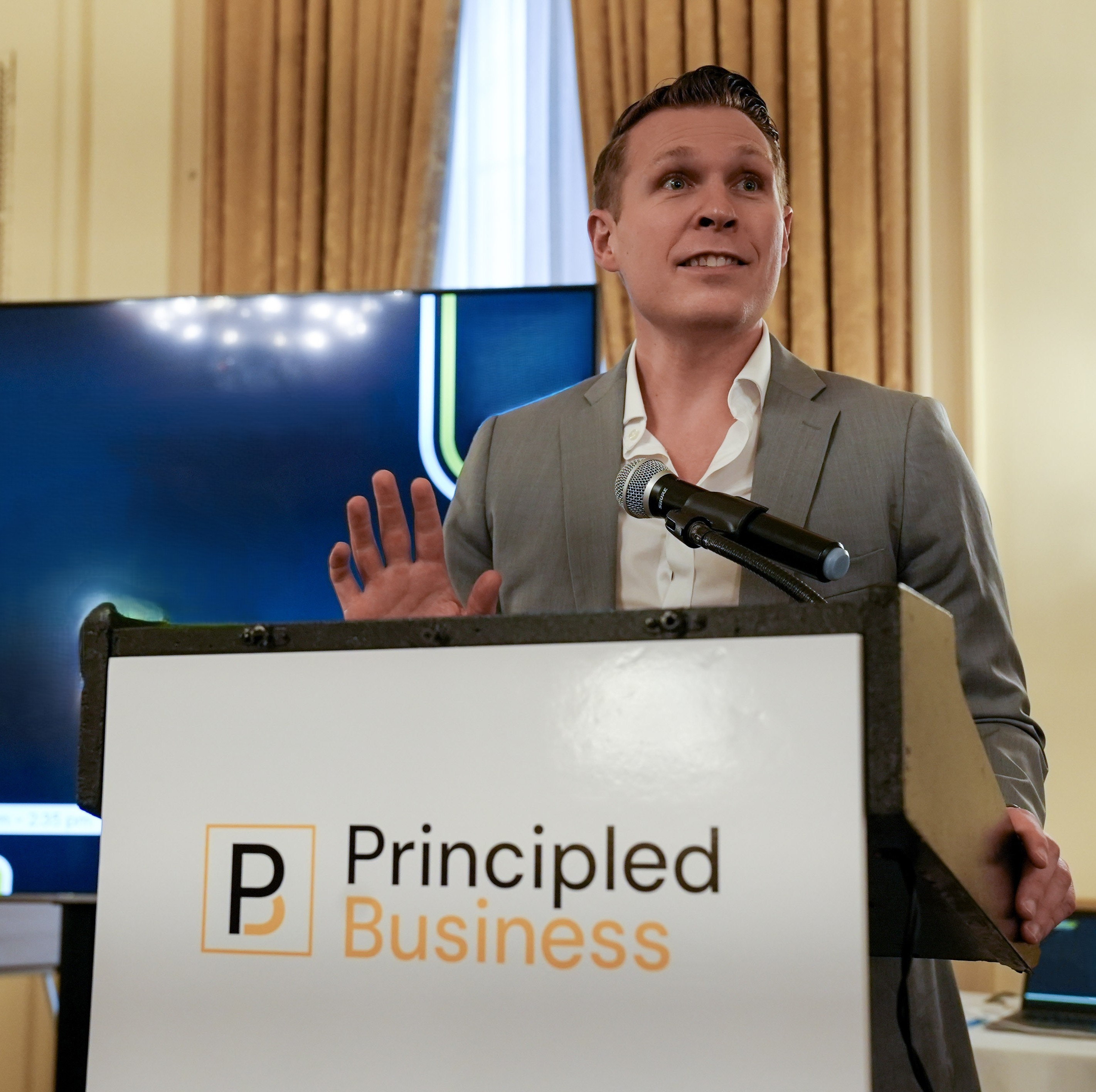 Business leader speaking on stage